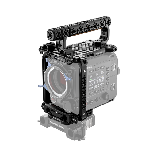 fujifilm eterna 55 camera body with wooden camera handle and accessories on a white background